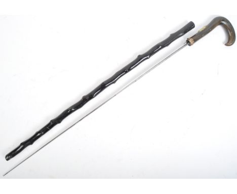 An antique Victorian Royal Hussars officers sword stick / walking cane with concealed stiletto blade. The cane having a hooke