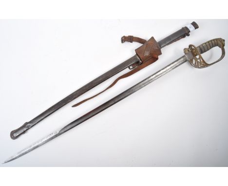 A 19th Century antique 1857 pattern British Infantry ' Engineers Volunteer ' sword. The sword having a chequered pommel, bras