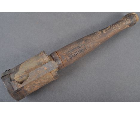 A rare original WWI First World War inert Imperial German Army stick grenade. The grenade of typical form, with a wooden hand