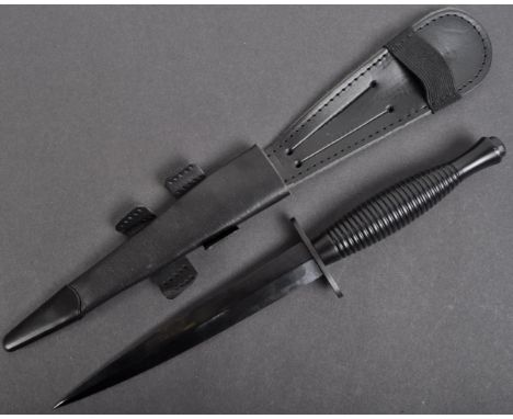 An original current issue Fairbairn Sykes FS British commando knife dagger. The knife having a nut to the pommel, ribbed hand