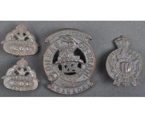 A collection of x4 WWI First World War C.E.F Canadian Expeditionary Force badges / cap badges comprising 48th Highlanders Of 