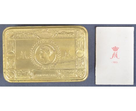 An original WWI First World War ' Princess Mary's Christmas Gift ' brass tin box. The surface of the lid decorated with a por