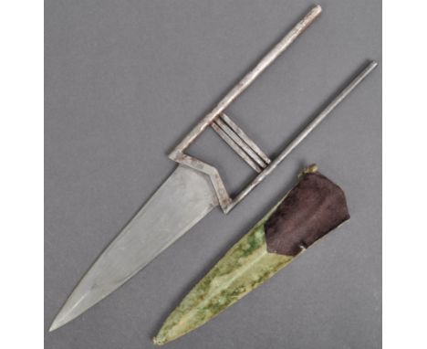 An antique late 19th Century Indian Katar / push dagger. The dagger of white metal construction having a thin triangular shap