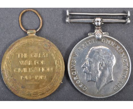 A WWI First World War medal pair for one 36835 Private A,E Gillett of the Devon Regiment. Comprising his Victory Medal and Wa