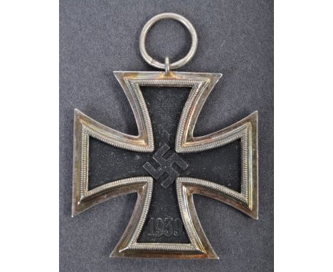 An original WWII Second World War Third Reich Nazi German Iron Cross Second Class medal with Swastika to the centre and stamp