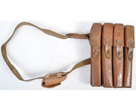 An original WWII Second World War German MP40 rifle ammunition pouch. The 4-slot German military magazine pouches of rigid le