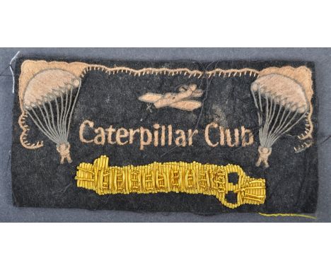 A WWII Second World War related Caterpillar Club uniform badge (for airmen who have successfully bailed out of a disabled air