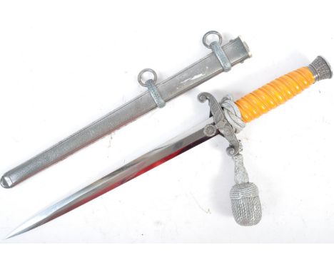 An original WWII Second World War Third Reich Nazi German Army dagger / sword with Portepee. The dagger having a steel oak le