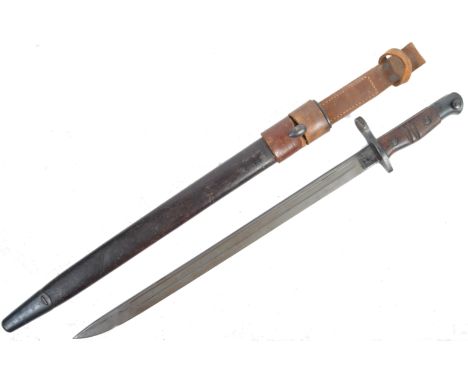 An original WWI First World War British made by US issued 1917 Remington rifle bayonet. The bayonet of usual form with carved