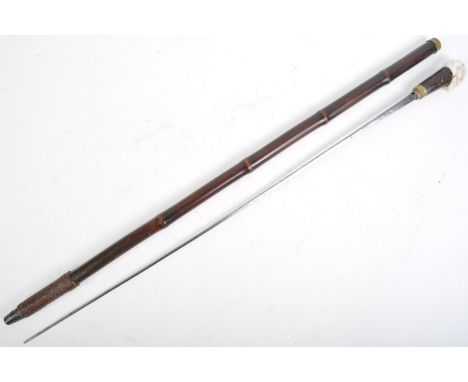 A 19th Century Victorian gentleman's ( possibly Masonic ) sword stick / walking cane with concealed blade. The cane having an