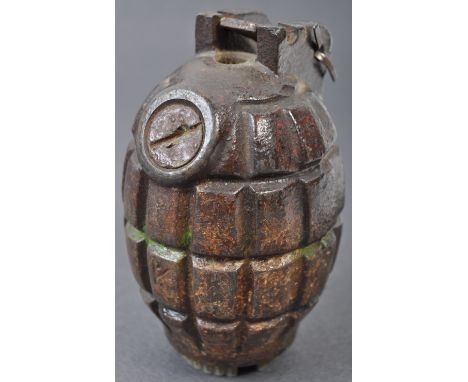 An original WWI First World War period British Army inert Mills Bomb / Hand Grenade. c1918. Typical form, being a complete ex
