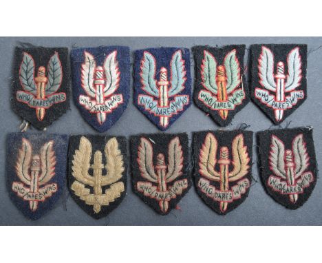 A collection of x10 WWII Second World War type (likely post-War) SAS Special Air Service beret cloth patches. Various forms a