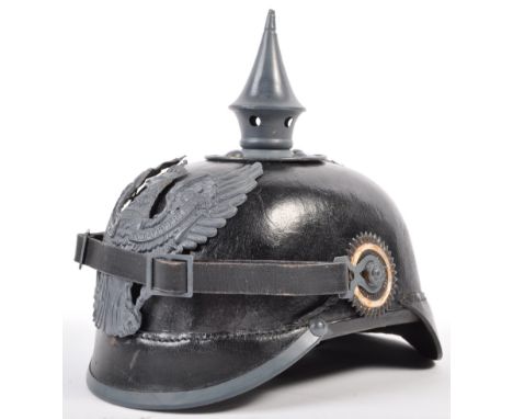 An original WWI First World War Imperial German Army / Prussian pickelhaube uniform helmet. Leather construction with metal f