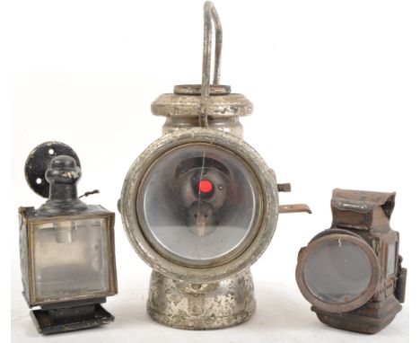 A collection of x3 antique early 20th century bicycle / carriage lamps. To include a larger Powell &amp; Hammer Ltd example, 