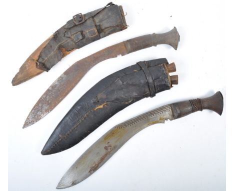 Two vintage 20th Century&nbsp;Nepal / Nepalese Gurkha Kukri knife daggers. The traditional Nepalese machete's having carved f