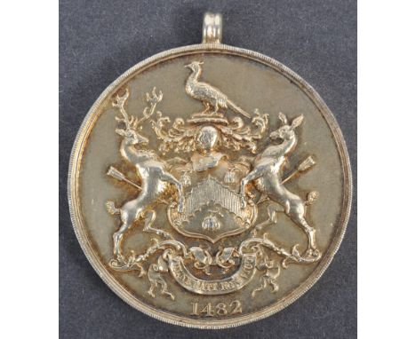 Collection of antique medallions - a vintage hallmarked silver medallion from the Worshipful Company of Cooks awarded to one 