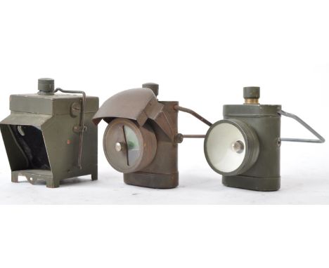 A collection of x3 original WWII Second World War period lanterns - all military issue - to include; x2 CH Ltd made bicycle l