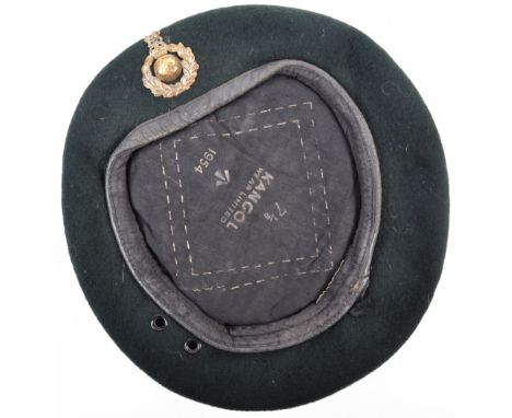 An original post-WWII Second World War British Army Royal Marines 1954 dated beret, with cap badge to front. Maker's marks fo