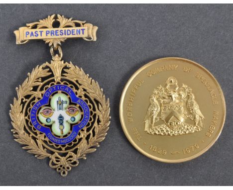 Collection of antique medallions - a vintage 1979 hallmarked medallion commemorating the 350th anniversary of The Worshipful 