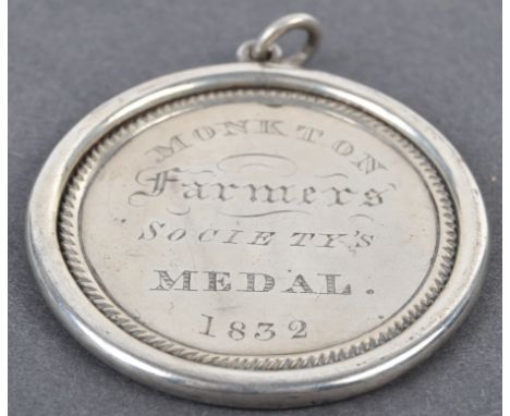 Collection of antique medallions - an early 19th century William IV period silver colour medal awarded from Monkton Farmers; 