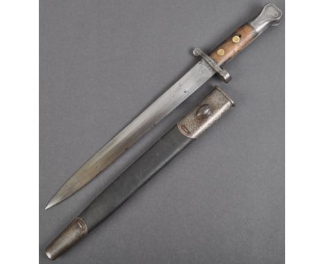 An antique 19th century Victorian 1897 pattern Lee Metford rifle bayonet P88. Push button release, with carved wooden grips, 