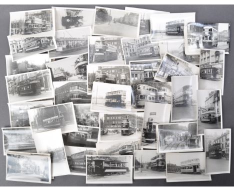 A large collection of 70+ vintage black and white photographs of trams and trolleybuses - from various location, and images a