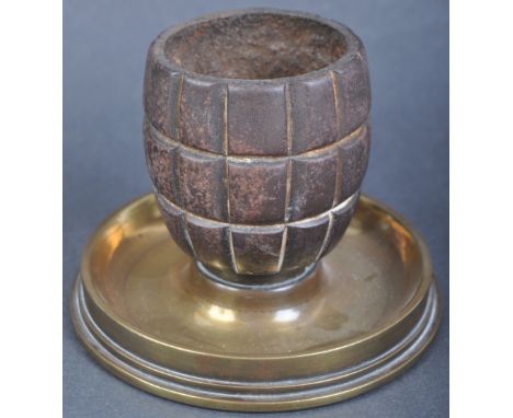 A WWI First World War trench art style ashtray and matchstrike combination, made from the base of a 1916 dated 18pdr brass ar