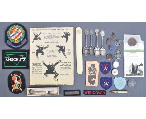A large collection of assorted British Rifle Club / Shooting club medals, patches, presentation spoons and medallions. The co