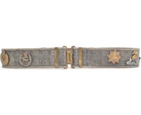 A WWII Second World War souvenir cap badge ' hate belt ' type display, comprising of x11 original British Army cap badges aff