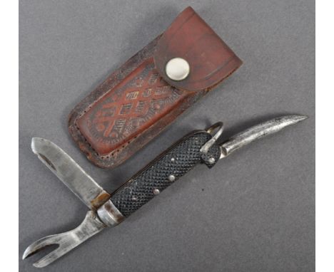 An original WWII Second World War 1943 dated British Army issue folding jack knife. The knife with various pull-out blades, s