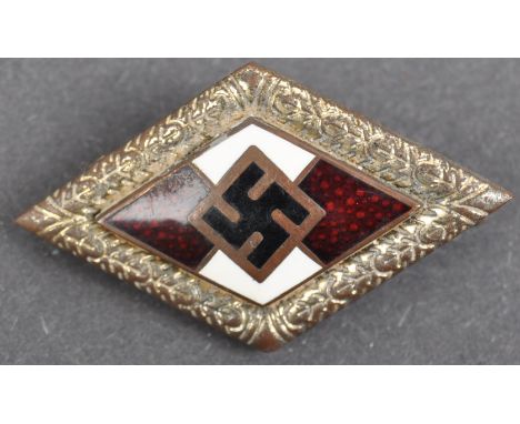 An original WII Second World War Third Reich Nazi German Hitler Youth Leaders badge. The badge being a Gold Class example in 