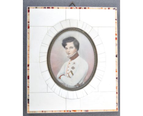 A charming 19th Century antique Napoleonic War interest hand painted portrait of Napoleon II on an inlayed Ivory frame. The f