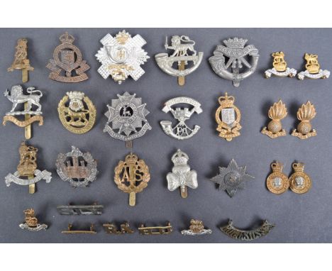 A large collection of x28 assorted British Army cap badges / uniform badges comprising&nbsp;Auxiliary Territorial Service, He