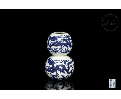 Modelled porcelain, in the form of a ‘Hulu' gourd with two superimposed rounded bodies, the upper one being slightly smaller,
