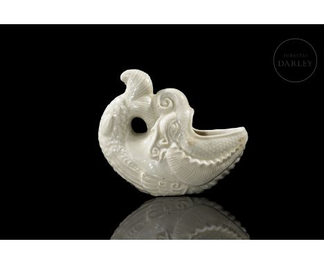 This ceramic is modelled and covered with a beautiful glaze of pure white glaze. It is in the shape of a fish, hollow inside,