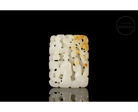 Beautifully carved white jade with traces of reddish patina and amber. It has a rectangular shape, with details in relief and
