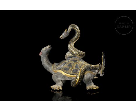 This ceramic is modelled and polychromed with gilt detailing. It shows the representation of the classical Chinese mythologic