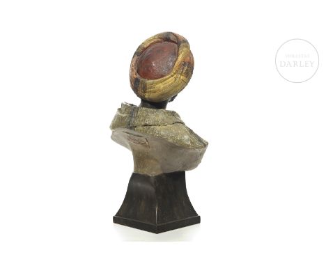 Polychrome terracotta sculpture. Bust depicting a man with a turban and beard. On the reverse is stamped "Goldscheider" and "