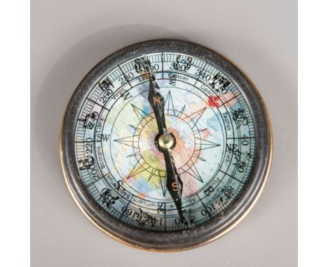 Marine directional Compass, with windrose one glass broken, dated  1917, 8cm diameter