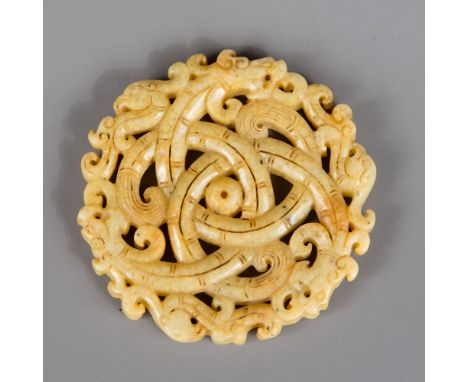 Chinese Jade Amulet, decorated with animals and volutes, open work with engravings, light green yellow colour, Qing Dynasty.