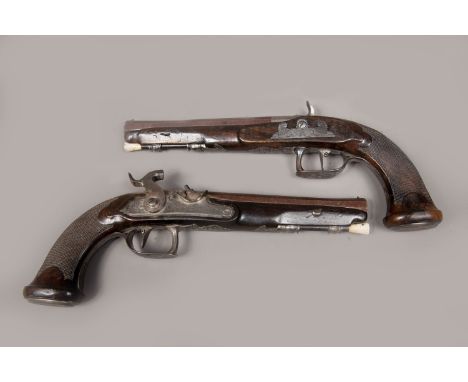 Pair of Barbey pistols, each with octagonal canted damascene barrel with iron nose, engraved, percussion lock, with engraving