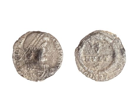 Roman, a silver siliqua struck for Jovian (AD 363-364) dating to c. AD 363-364. Obverse: DN IOVIA-NVS PF AVG, pearl-diademed,