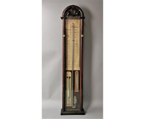 An Admiral Fitzroy wall barometer in a mahogany case, the glazed front with turned bone key, 106 cm high x 23.5 cm wide 