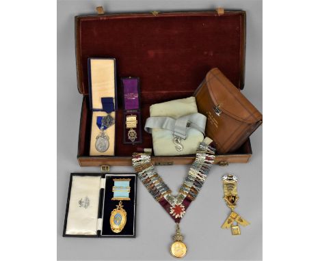 A collection of Masonic medals presented to W. Bro. Bignell George Elliott, comprising an 18ct gold Saint Botolph's Lodge 202