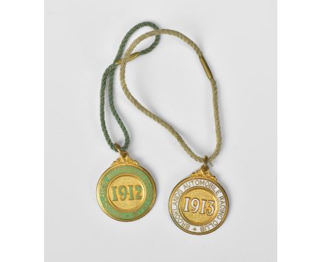Two Brooklands Automobile Racing Club medals, one with green enamel, the other white, numbers to the back reading No.1459 and