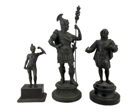 Three spelter figures comprising a 19th/ early 20th century figure of a Greek Warrior, 19th century patinated spelter figure 