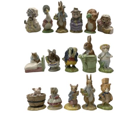Sixteen Beswick Beatrix Pottery figures, each with crest marsk, including Peter in the Watering Can, Yock-Yock in the Tub, To