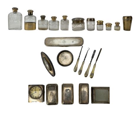 Extensive early 20th century silver and silver gilt ladies travelling toilet set, each piece engraved with a coronet and init