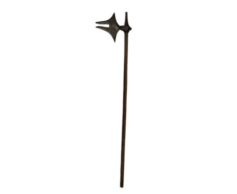 Indian 'Bullova' fighting axe, early 19th century from the Khond region of Chota Nagpur with wooden haft 94cm long