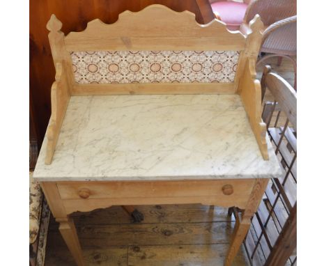 An Edwardian Pine white marble top tile back washstand